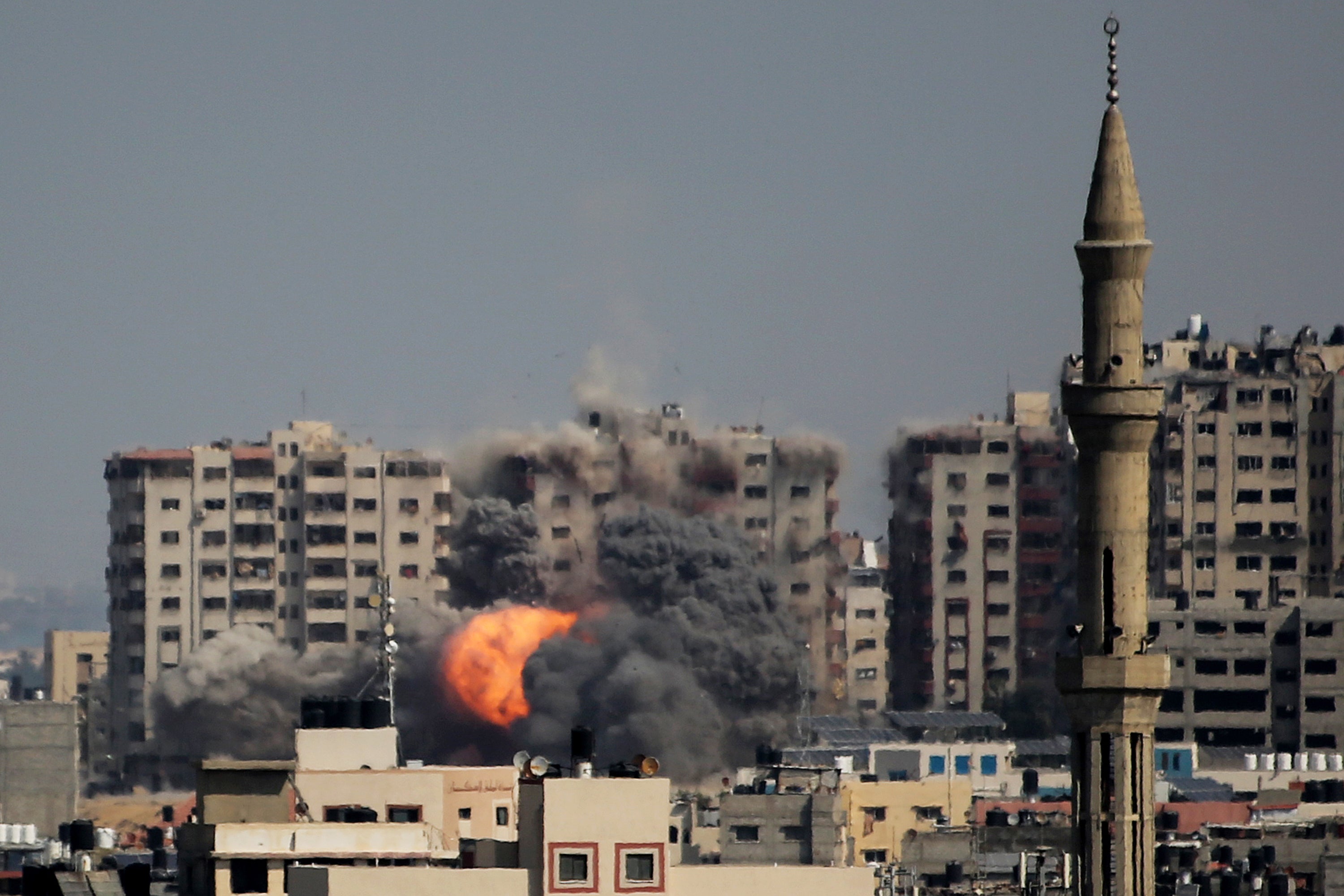 An explosion on a residential tower caused by Israeli raids in the northern Gaza strip