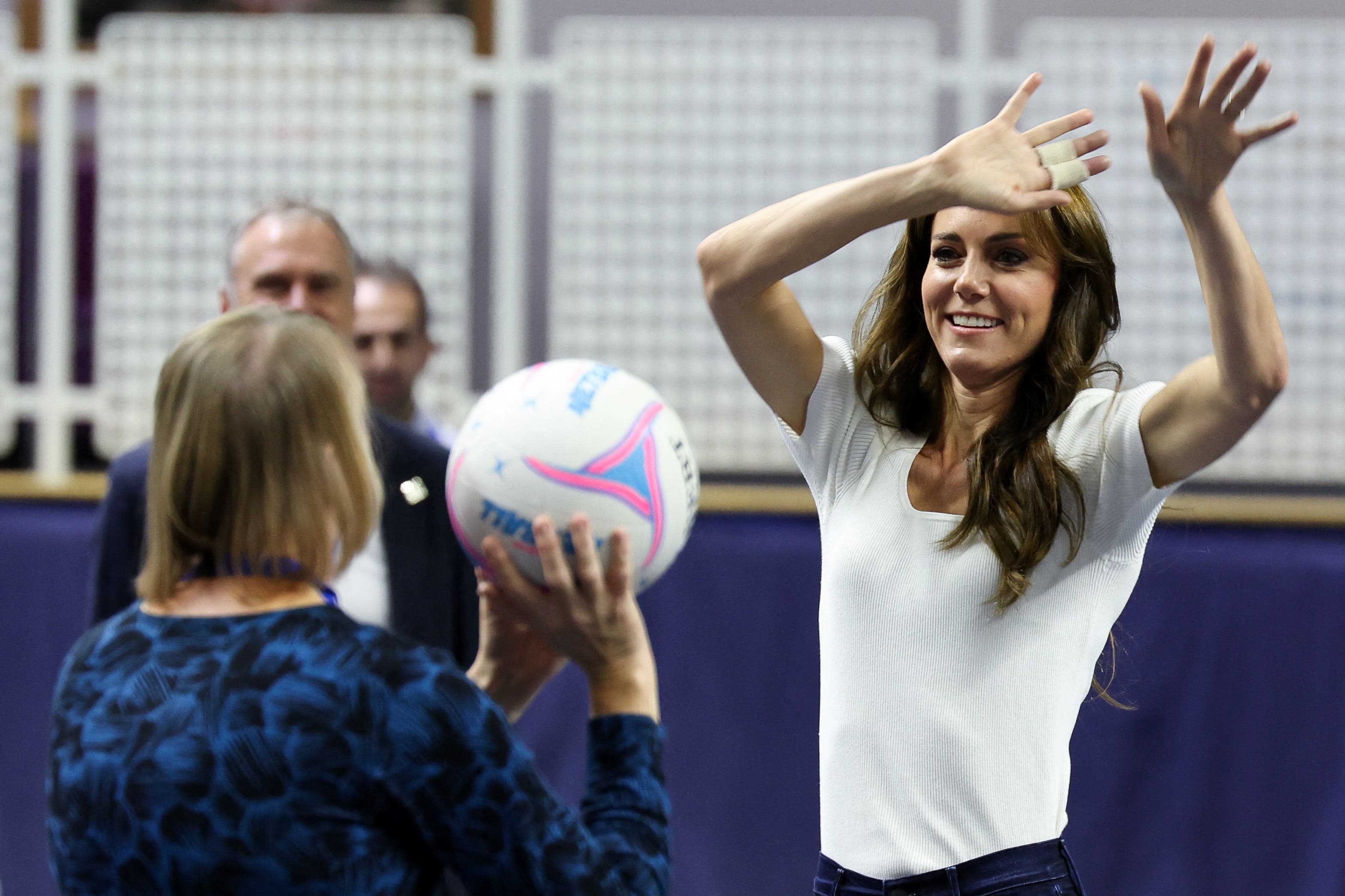 The Princess of Wales plays netball as she attends a mental fitness workshop run by SportsAid at Bisham Abbey National Sports Centre in Marlow (Suzanne Plunkett/PA)