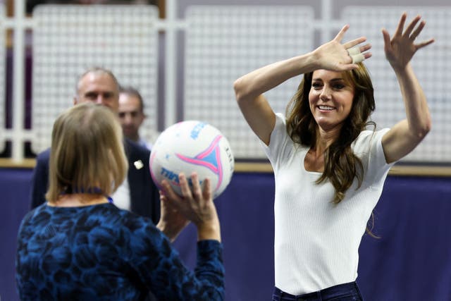 The Princess of Wales plays netball as she attends a mental fitness workshop run by SportsAid at Bisham Abbey National Sports Centre in Marlow (Suzanne Plunkett/PA)