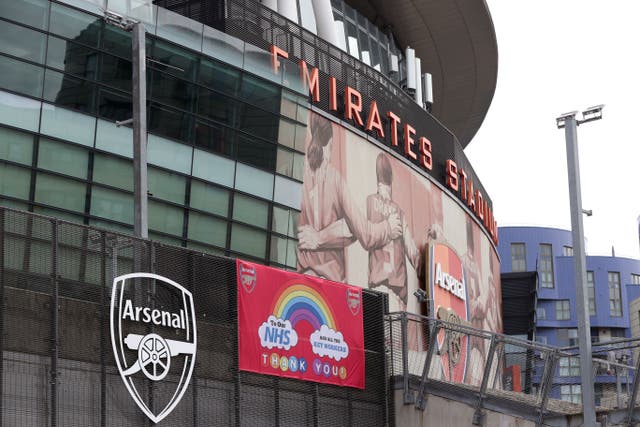 An NHS banner outside Emirates Stadium, home of Arsenal, during the Covid-affected 2019/20 Premier League season (Jonathan Brady/PA)