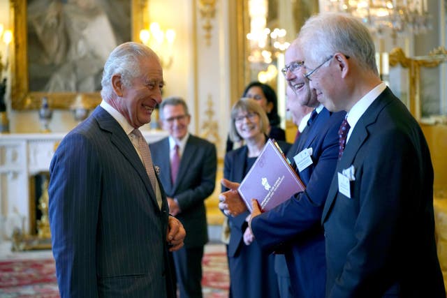 The King talks to guests as he presents the 2022 and 2023 Queen Elizabeth Prize for Engineering during a reception at Buckingham Palace in London (Yui Mok/PA)