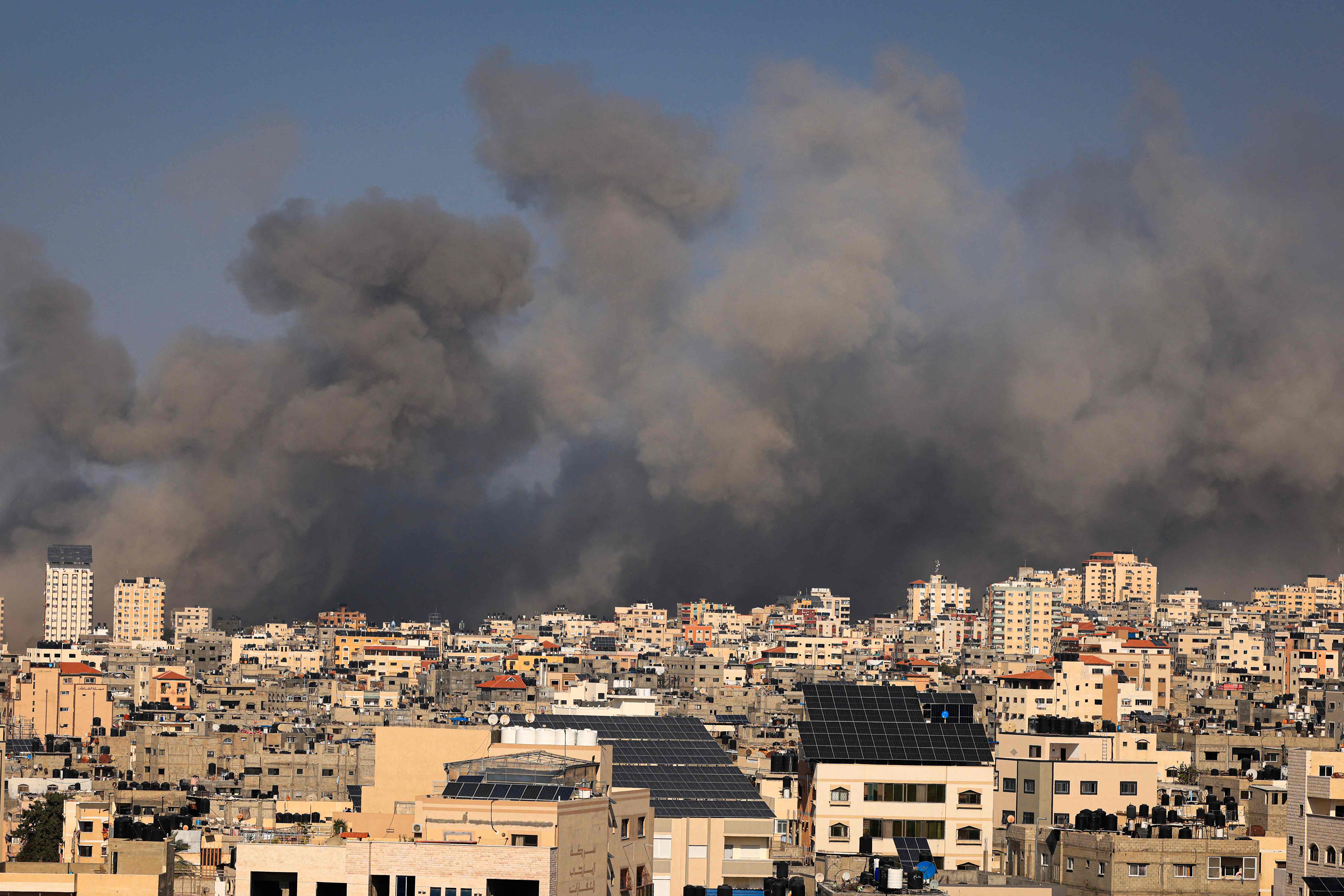 Smoke billows during Israeli air strikes in Gaza City