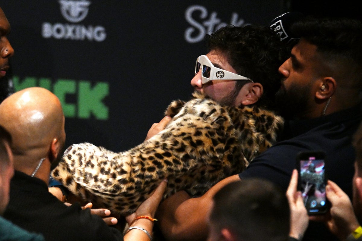 Dillon Danis hits Logan Paul in the head with microphone as press  conference descends into chaos | The Independent