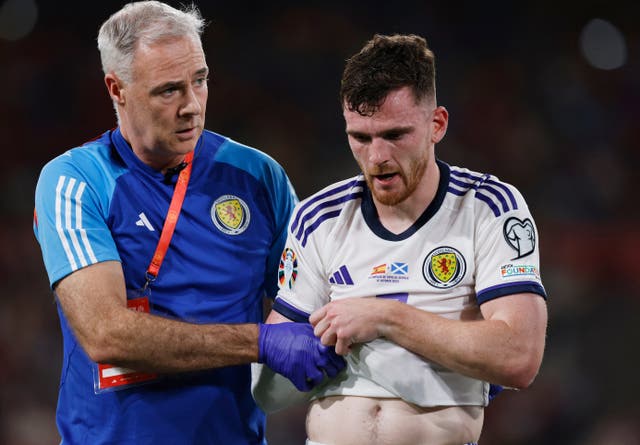 <p>Andy Robertson went off with his arm in a sling </p>