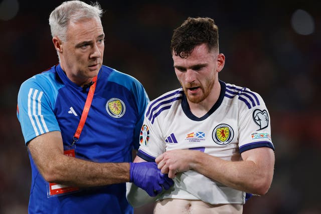 <p>Andy Robertson went off with his arm in a sling </p>