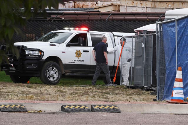 <p>The remains of some of the decomposing bodies discovered at the Return to Nature Funeral Home in Penrose, Colo., arrive at the El Paso County Coroner's Office in Colorado Springs, Colo., Tuesday, Oct. 10, 2023. Temporary structures and refrigerated trucks filled a parking lot next to the office where they will be beginning the massive task of trying to identify the remains. (Jerilee Bennett/The Gazette via AP)</p>