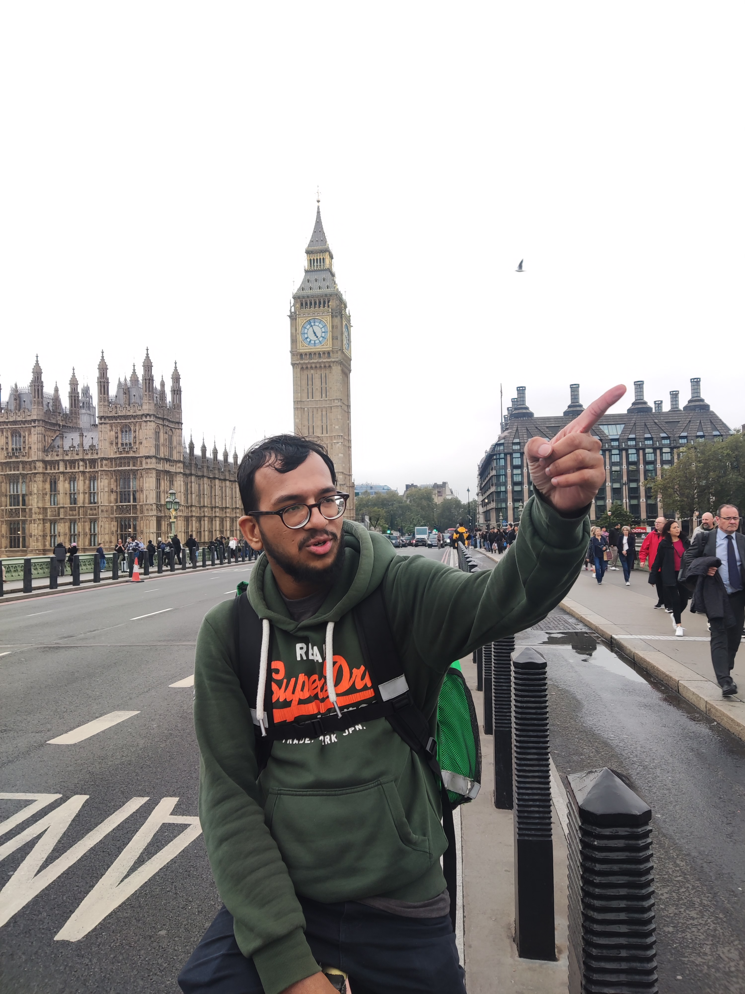 Courier Shaf Hussain enjoying the sights on Westminster Bridge