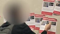 Posters of kidnapped Israelis stuck to wall outside BBC Broadcasting House