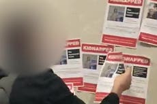 Posters of kidnapped Israelis stuck to wall outside BBC Broadcasting House