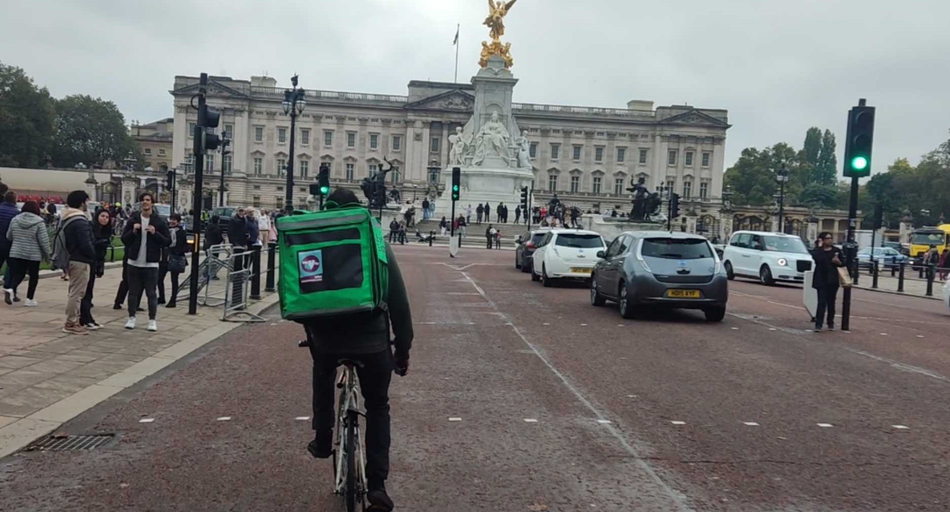 A royal order? Shaf gazes at Buckingham Palace on his way around the city