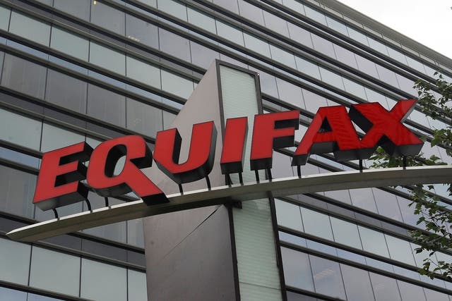 The UK’s financial watchdog has fined Equifax £11 million for its role in one of the largest cyberattacks (Mike Stewart/AP)