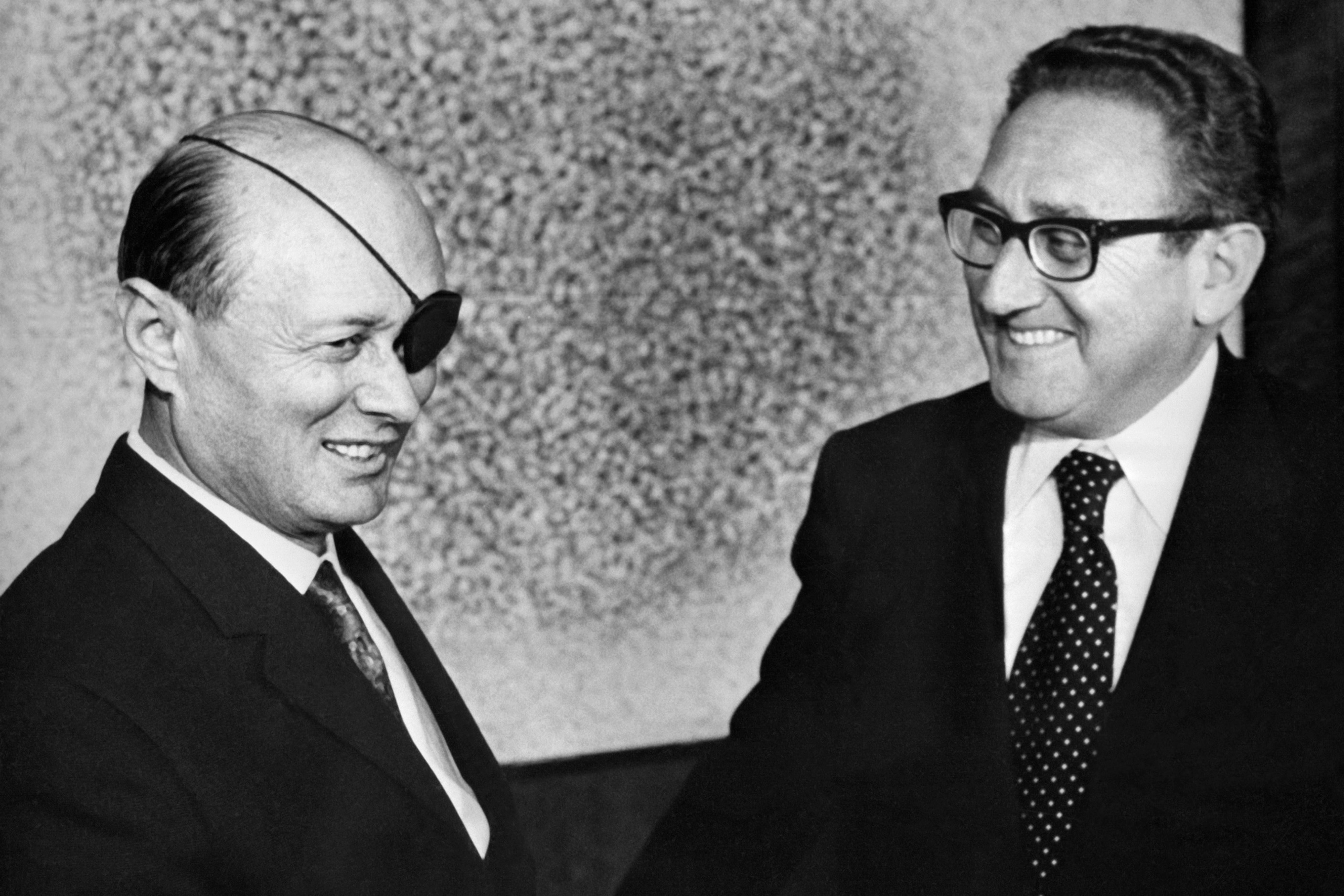 US Secretary of State Henry Kissinger, right, meets with Israel’s Defence Minister Moshe Dayan in Tel Aviv on 8 January, 1974