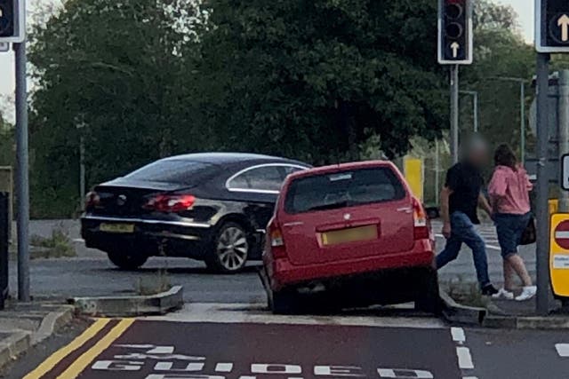 <p>A car getting stuck in the bus lane trap at the junction of Station Road and Harrison Way in St Ives</p>