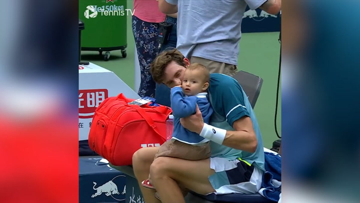 Tennis player’s adorable son toddles onto court to share hug with father