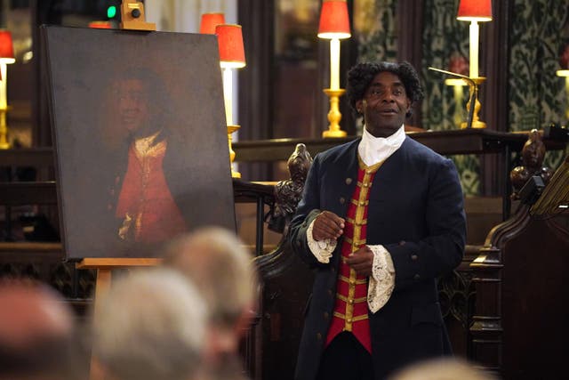 Actor and writer Paterson Joseph performs excerpts from his novel The Secret Diaries of Charles Ignatius Sancho in St Margaret’s Church, Westminster (Lucy North/PA)