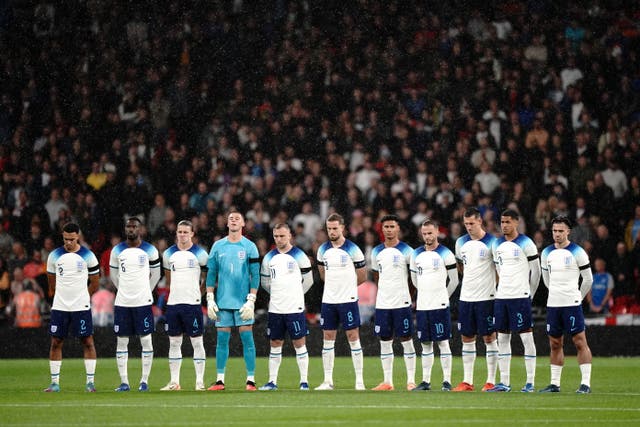 England players observe a moment’s silence for the victims of the Israel-Palestine conflict (Zac Goodwin/PA)