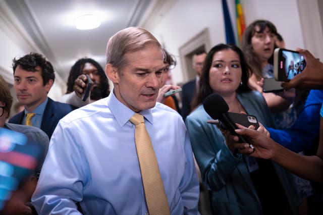 <p>Rep. Jim Jordan, R-Ohio, chairman of the House Judiciary Committee and a staunch ally of former President Donald Trump, talks with reporters as House Republicans meet again behind closed doors to find a path to elect a new speaker </p>