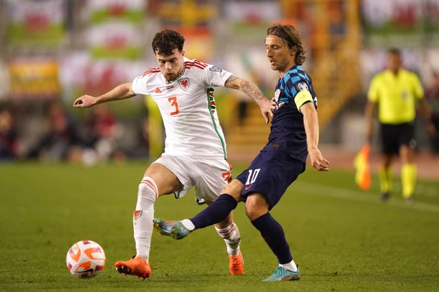 Wales’ Neco Williams, left, and Croatia’s Luka Modric in action during their 1-1 draw in Split in March (Tim Goode/PA)
