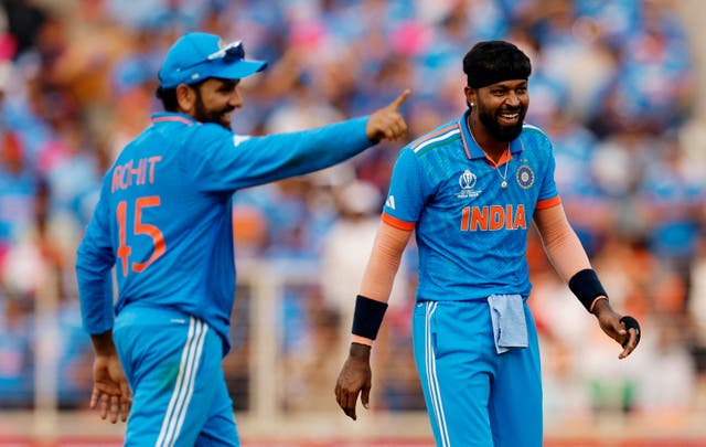 <p>India's Hardik Pandya celebrates with Rohit Sharma after taking the wicket of Pakistan's Mohammad Nawaz, caught by Jasprit Bumrah on 14 October </p>
