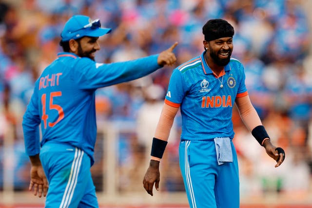 <p>India's Hardik Pandya celebrates with Rohit Sharma after taking the wicket of Pakistan's Mohammad Nawaz, caught by Jasprit Bumrah on 14 October </p>