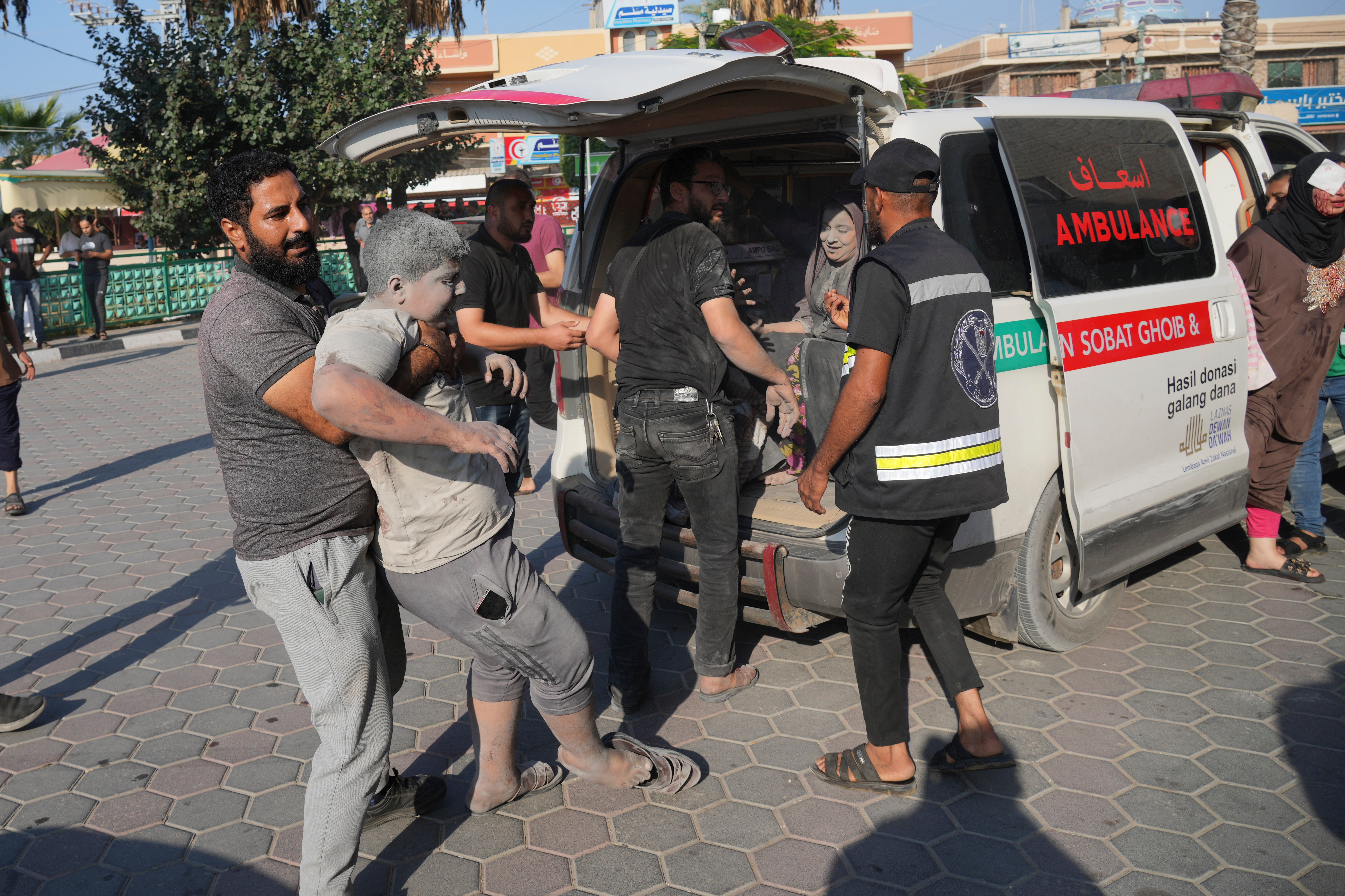 Palestinians wounded in Israeli airstrikes on Gaza Strip are brought to al-Aqsa hospital in Deir el-Balah City