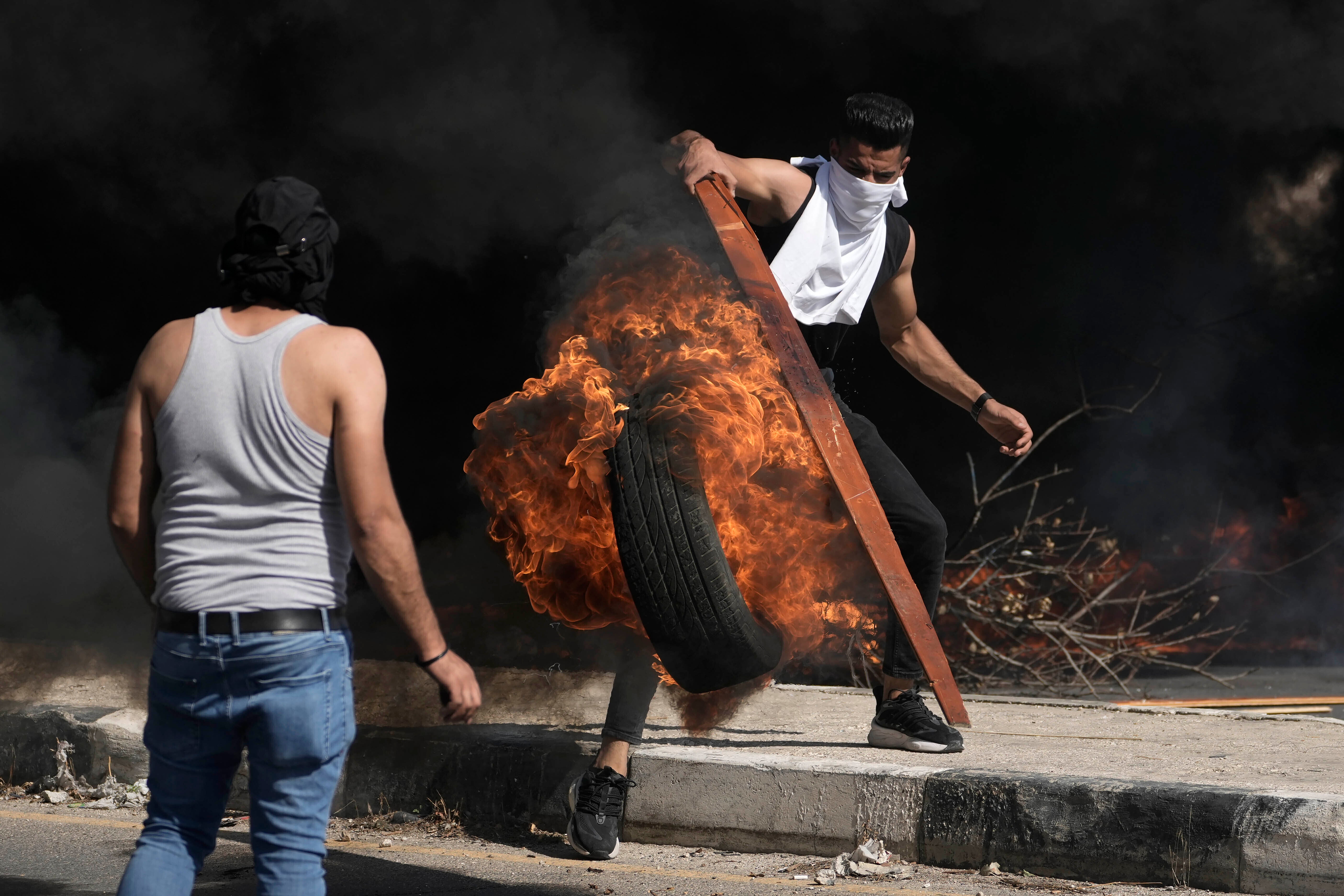 Palestinians clash with Israeli forces in the West Bank city of Nablus on Friday