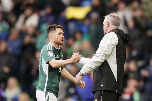 Northern Ireland’s Paul Smyth (left) is congratulated by manager Michael O’Neill (Niall Carson/PA).