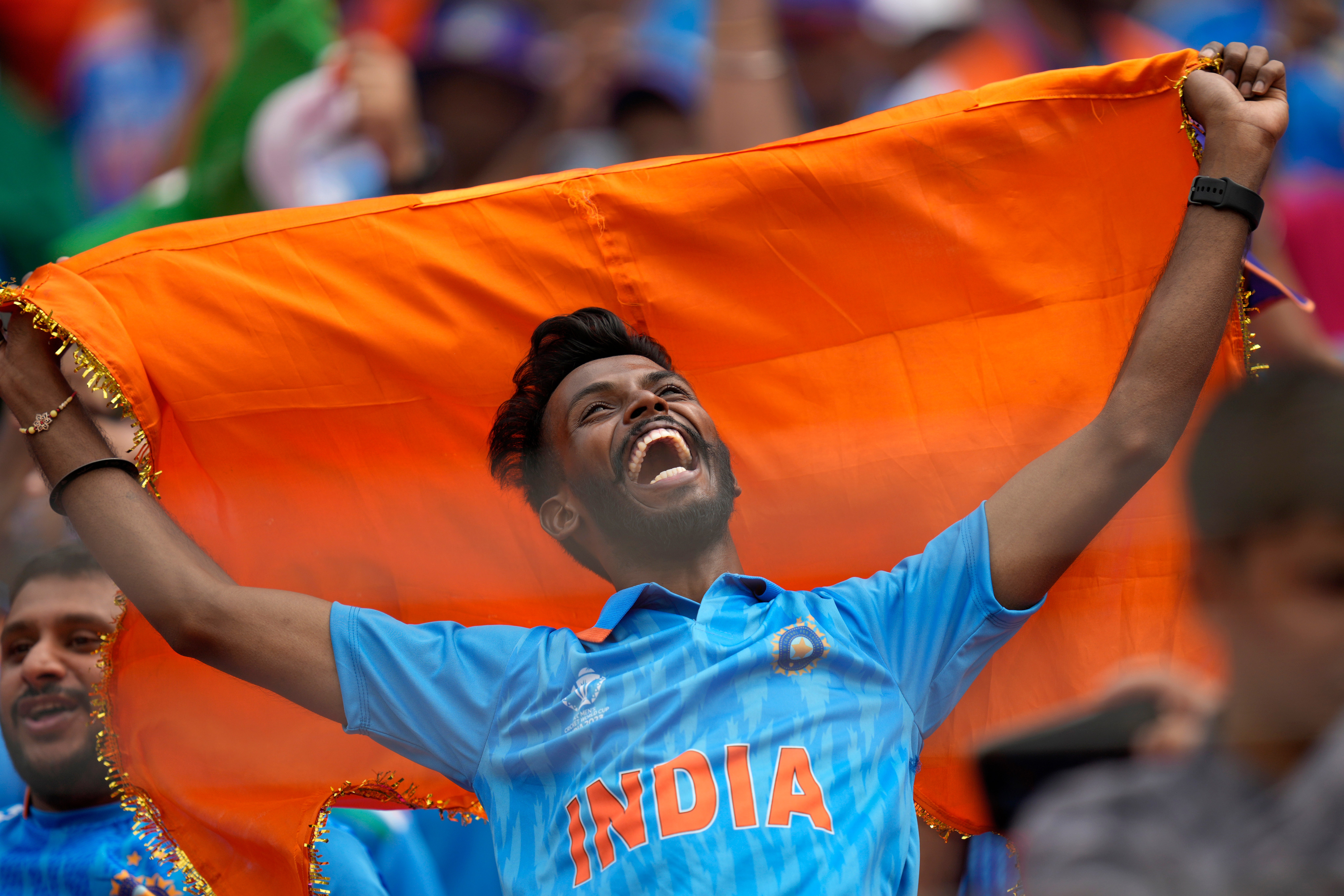 A fan cheers for the Indian cricket team before the start of ICC Men's Cricket World Cup match between India and Pakistan