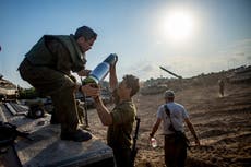 Israelis and Palestinians stare death in the face as they wait for the invasion