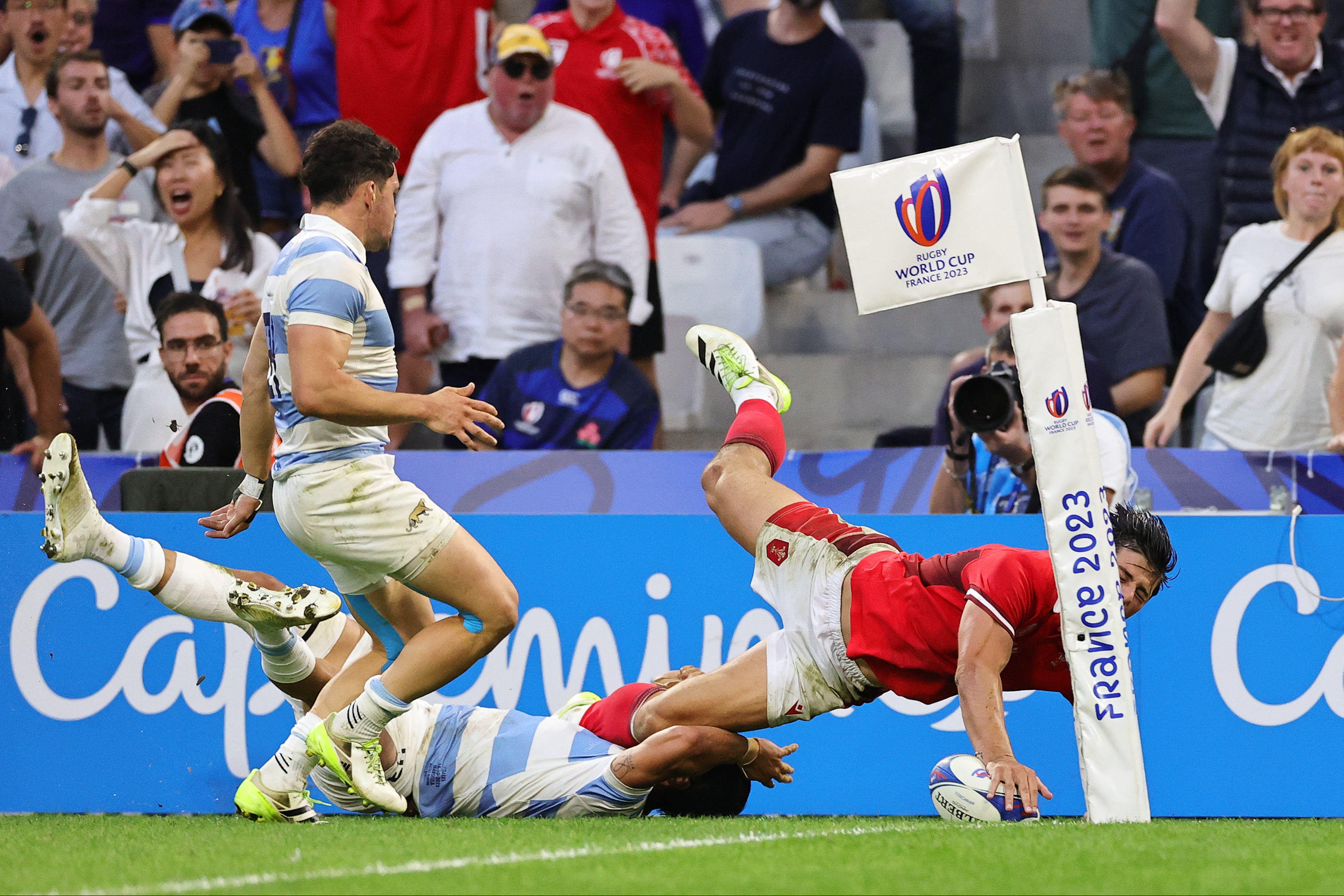 Louis Rees-Zammit came within inches of scoring late on in Marseille, tackled by Matias Moroni of Argentina