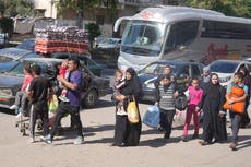 Weary families trudge through Gaza streets, trying to flee the north before Israel's invasion