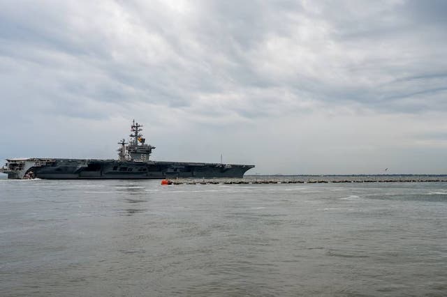 <p>The Nimitz-class aircraft carrier USS Dwight D. Eisenhower (CVN 69) (Ike) deploys from Naval Station Norfolk, Oct. 14, 2023. </p>
