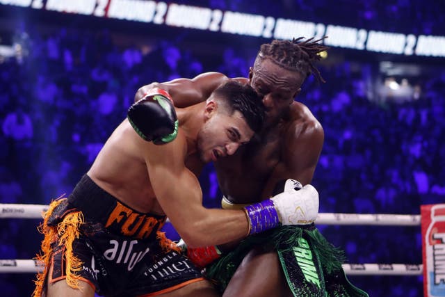 Tommy Fury (left) and KSI in action during their bout (Will Matthews/PA)