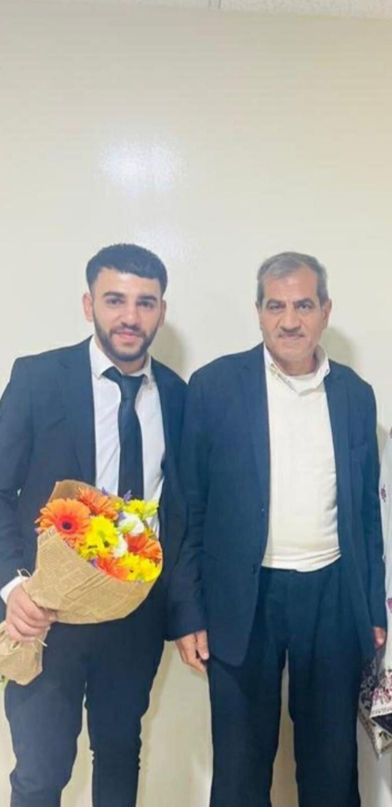<p>26 year old Ahmed Al Wadi and his father 63 year old Ibrahim Al Wadi at Ahmed’s graduation 6 months ago. They were both killed by Israeli settlers in Qusra village this week </p>