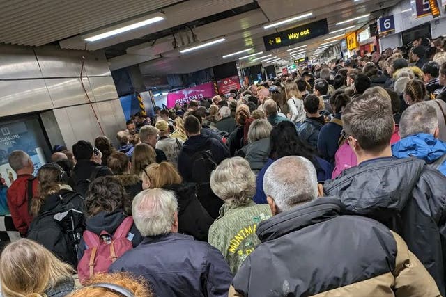 The points problem led to crowds of passengers building at Euston (Dani Mirza McGarvey/ PA)