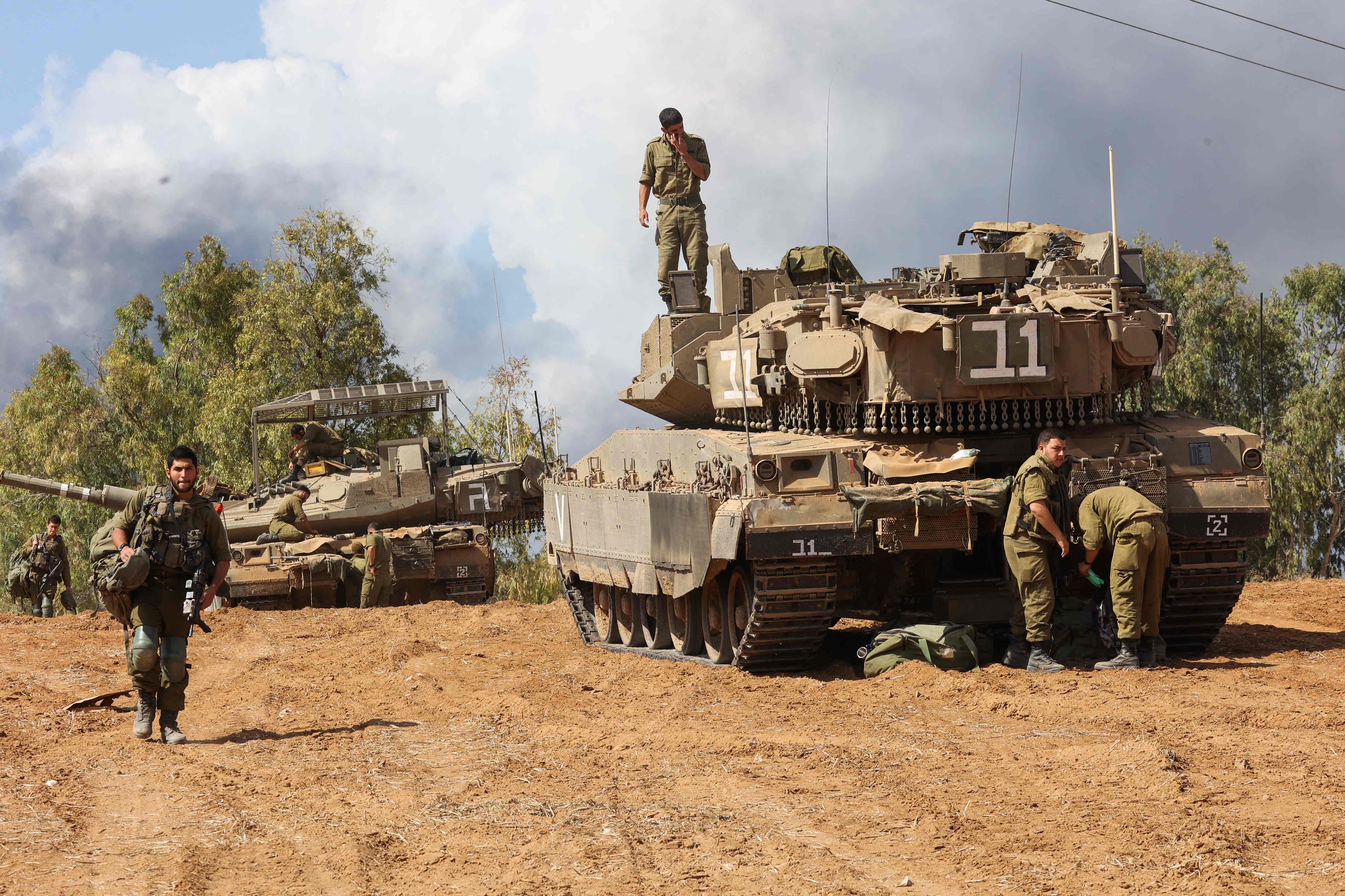 Israeli army personnel prepare for battle near Ashkelon on Sunday