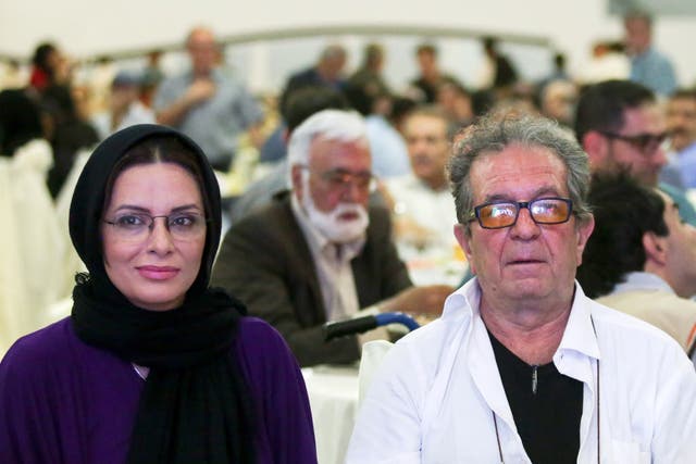<p>File Iranian film director Dariush Mehrjui and his wife Vahideh Mohammadifar attend a film directors' meeting in Tehran, Iran. They were stabbed to death in their home by an unknown assailant on Sunday </p>