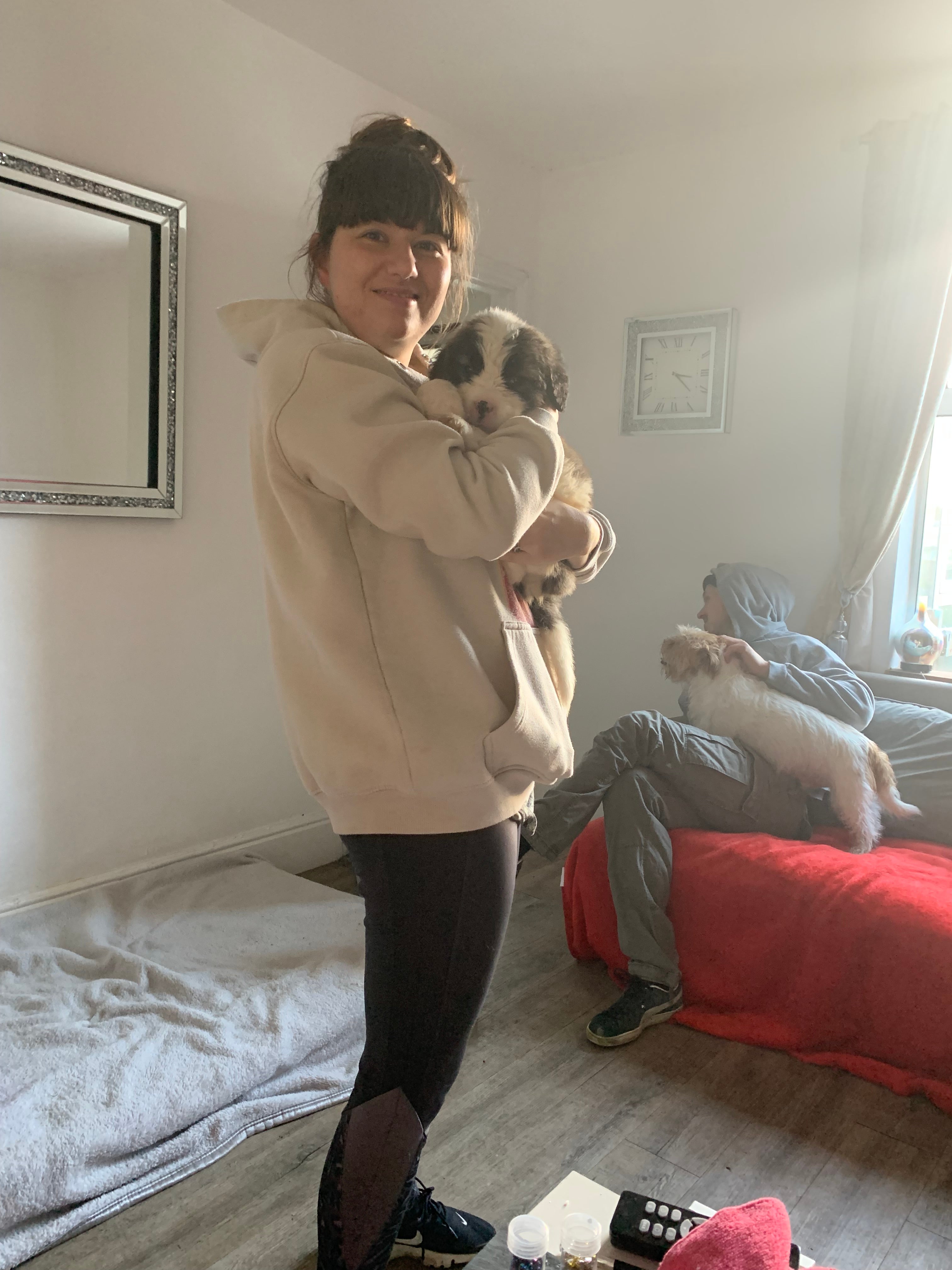 Happier times: Rachel Adams and her new puppy.