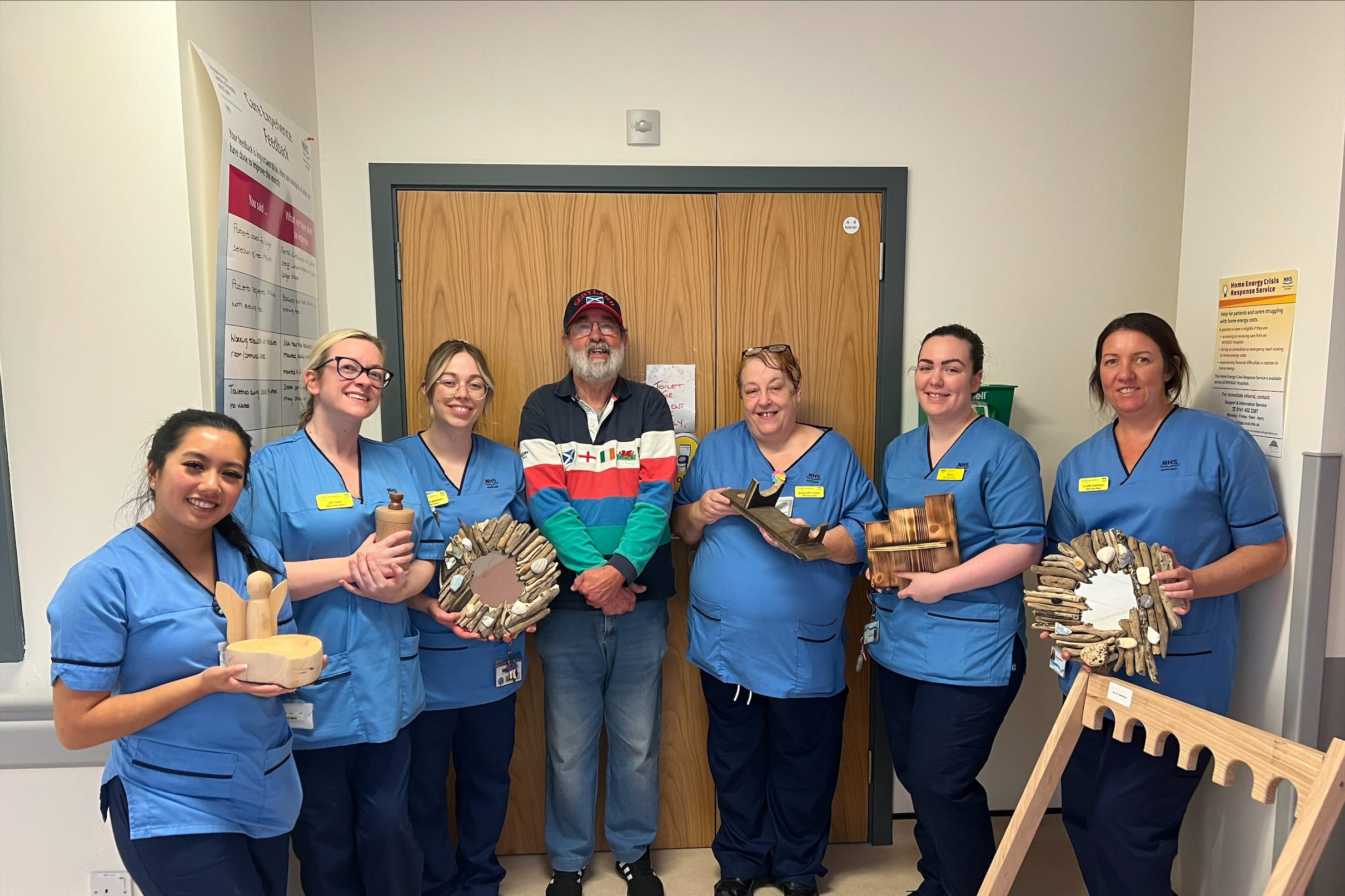 Campbell McDonald pictured with staff nurses Allyssa Fernandez, Jacqueline Laird, Amber Mathieson, Margaret Pollock, Rikki Harper and Claire Sutherland (NHS Greater Glasgow and Clyde/PA)