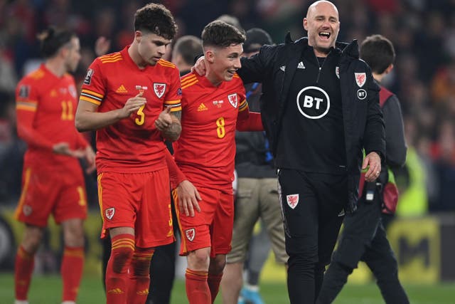 Harry Wilson, centre, wants Rob Page, right, to stay as Wales boss (Simon Galloway/PA)