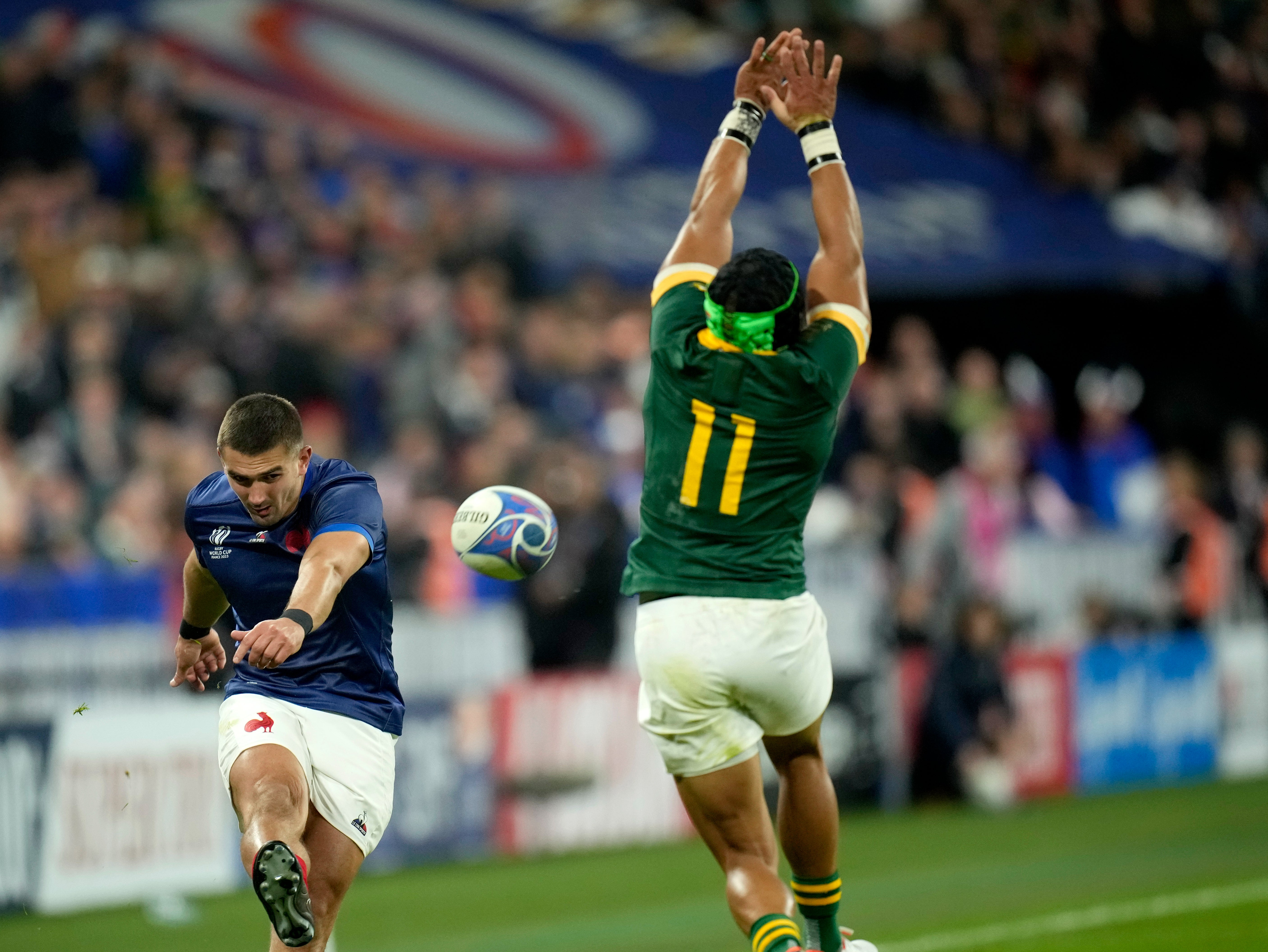 France's Thomas Ramos has his try conversion kick charged down by South Africa's Cheslin Kolbe