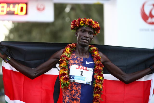 <p>Titus Ekiru celebrates after winning the Honolulu Marathon</p>