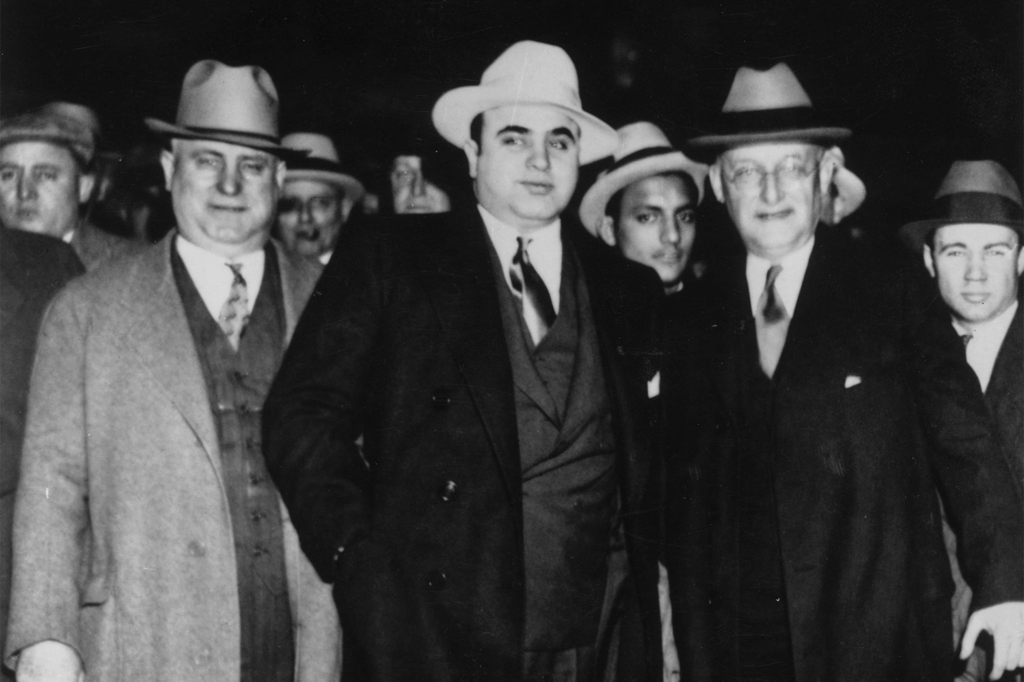 circa 1930: Italian-American gangster Al Capone with US Marshal Laubenheimer