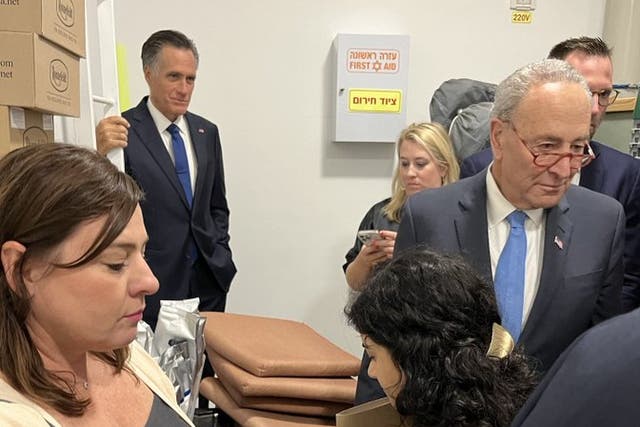 <p>Sens Mitt Romney and Chuck Schumer were part of the congressional delegation rushed to a shelter as Hamas launched rockets at Israel</p>