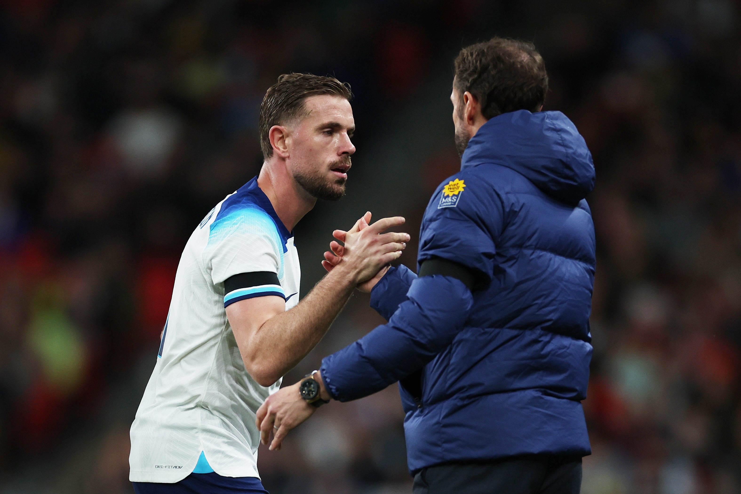 Jordan Henderson is greeted by Gareth Southgate after he was brought off against Australia