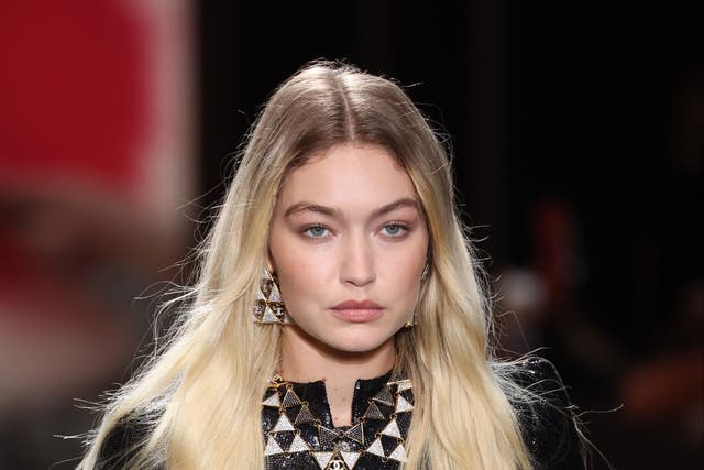 Gigi Hadid twins with baby daughter Khai in new photos