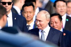 Putin arrives in China on rare trip abroad to meet ‘dear friend’ Xi Jinping