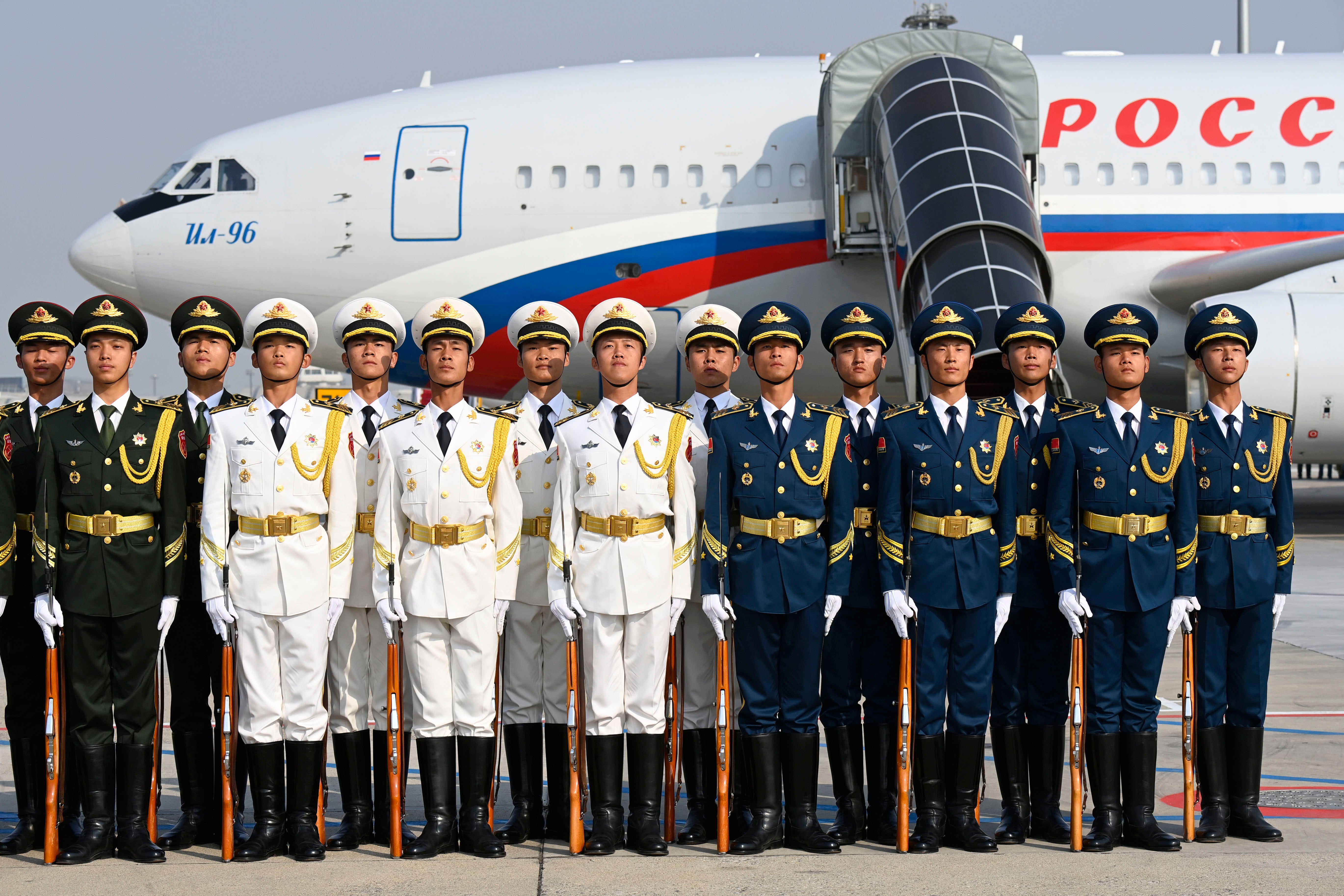 Chinese honor guards are seen after welcoming Russia's President Vladimir Putin at Beijing Capital International Airport