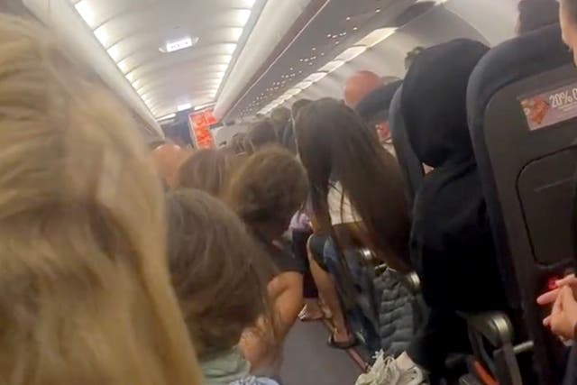 <p>A video posted to X shows passengers’ frustrated reactions  </p>