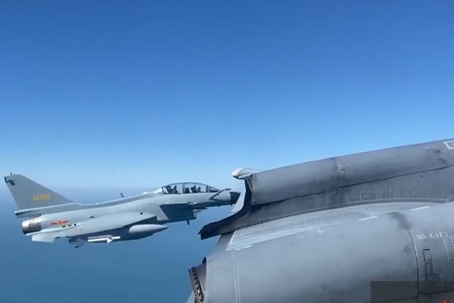 <p>Moment when Chinese fighter jet came ‘dagerously’ close to Canadian aircraft over international water, according to Global News  </p>